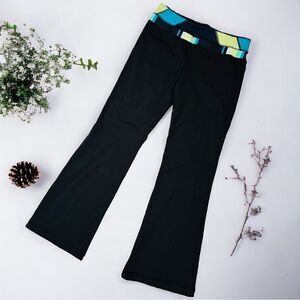 Lululemon Groove Mid-Rise Flare Pants Women's Black Yellow Teal Yoga Sz 10